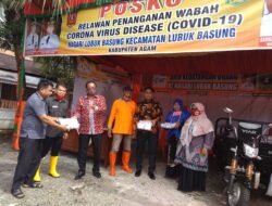 Pemkab Agam Beri Bantuan Pangan Pada Keluarga Terdampak Pandemi Corona