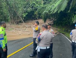 Polres 50 Kota Turunkan Personel Tangani Banjir dan Longsor