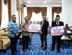 Dana Hibah Pilkada Serentak Tanah Datar Diserahkan
