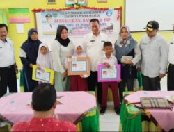 Bupati Rusma Yul Anwar Salurkan Bantuan PIP Tahap I