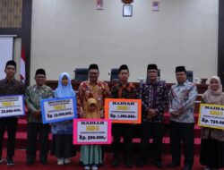 Pemko Serahkan Uang Pembinaan dan Tabanas Juara MTQN XLI 2024 Tingkat Kota Payakumbuh