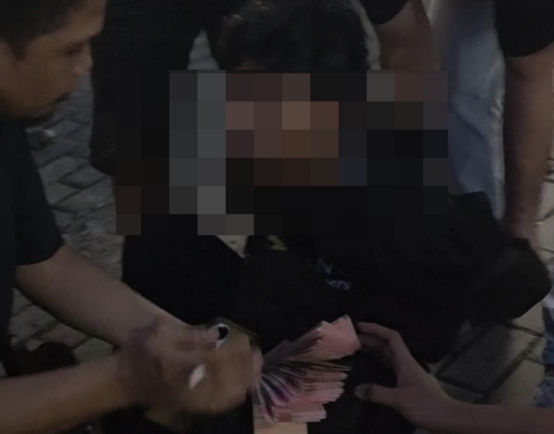 Tersangka diamankan polisi. (ist)