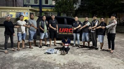 Tersangka diamankan polisi. (ist)